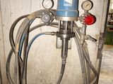 a picture of a water heater with a hose attached to it