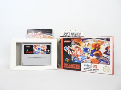 deux jeux Nintendo dans une boîte posée sur une surface blanche