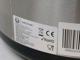 an image of a close up view of a stainless steel slow cooker