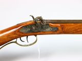 a close up of a rifle on a white background with a white background
