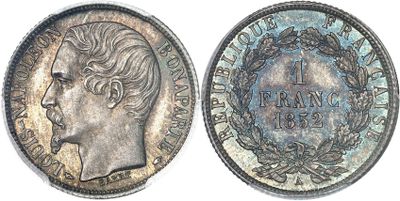 a close up of a coin with a woman ' s face on it
