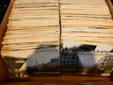 a box full of old photos on a table