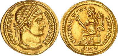 a gold coin with an image of a woman on it