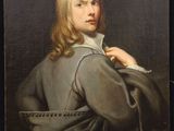 portrait d'un jeune homme en manteau gris