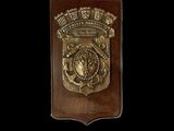 un gros plan sur une plaque sur laquelle figure un lion