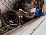 an image of a close up of a microwave with a bunch of wires
