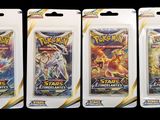 three packs of pokemon trading cards are shown on a black background