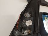 the side view mirror of a car with a broken mirror on it