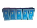 four blue boxes of perfume sitting on top of a white surface