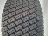 a close up of a tire with a red line on the side of it