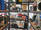 a room filled with lots of assorted items on shelves