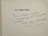 un livre ouvert sur lequel est inscrit un poème écrit à la main