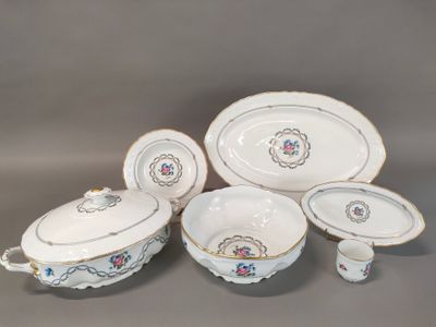an image of a group of porcelain dishes and bowls on a table