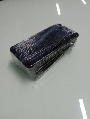a piece of plastic wrapped in plastic sitting on top of a table