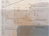 a picture of a receipt with a picture of a plane on it