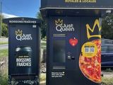 two vending machines that have pizzas on them