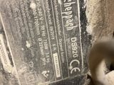 a close up view of a piece of metal with a label on it