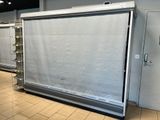 an image of a commercial refrigerator in a commercial kitchen