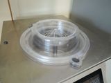 an image of a microwave with a plastic cover on top of it