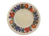 a white plate with a colorful design on it