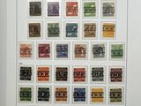an image of a picture of a picture of a bunch of stamps on a wall