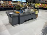 an image of a grocery store with produce on display