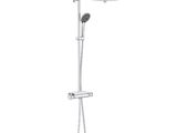 a close up of a shower head with a hand shower
