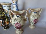 three vases sitting next to each other on a table