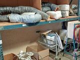 many boxes and boxes on the shelves in the room