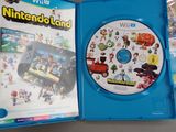 nintendo wii wii game in a blue case with a wii game on top of it