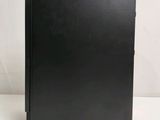 a black binder sitting on top of a white table