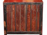 an image of a wooden cabinet with a red top