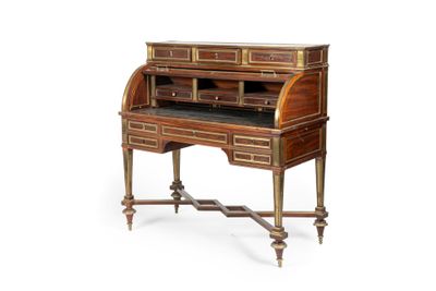an antique writing desk with drawers and a marble top