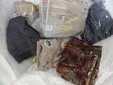 many items in a plastic bag on the floor