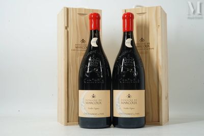 two bottles of wine in a wooden box on a white surface