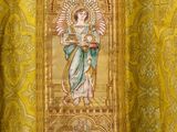 an image of a painting of a woman holding a cross
