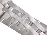 an image of a close up of a watch bracelet on a white surface