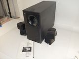 a black speaker system on a white table
