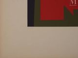 painting on the wall of a room with a red, green, and black design