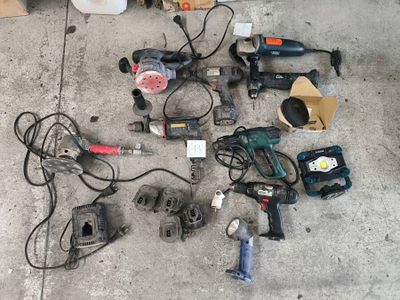 a lot of power tools that are on the ground