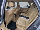 the interior of a car with tan leather seats and black trims