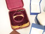 a box with a ring inside of it on a table