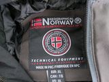 the label of a jacket with a fur collar on it