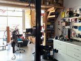 an image of a garage with tools on the shelves