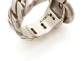 a close up of a ring on a white surface