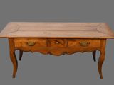 an old wooden table with two drawers and a drawer underneath it
