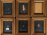 six framed pictures of a woman ' s face and a man ' s face