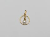 a gold plated pendant with a pearl in a circle