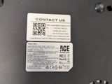 a close up of a laptop with a contact us sticker on it