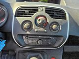 a dashboard of a car with a steering wheel and dashboard controls